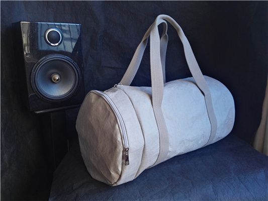 Sustainable travel bag, gym bag are made of washable washable kraft paper gym...