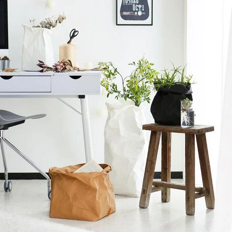 Washable kraft paper bags and planters arranged in a bright living space